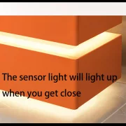 Noptiera inteligenta cu incarcare wireless, iluminare LED, 2 sertare de depozitare, senzor de lumina nocturna si incuietoare codificata – portocalie, design modern din sticla si lemn